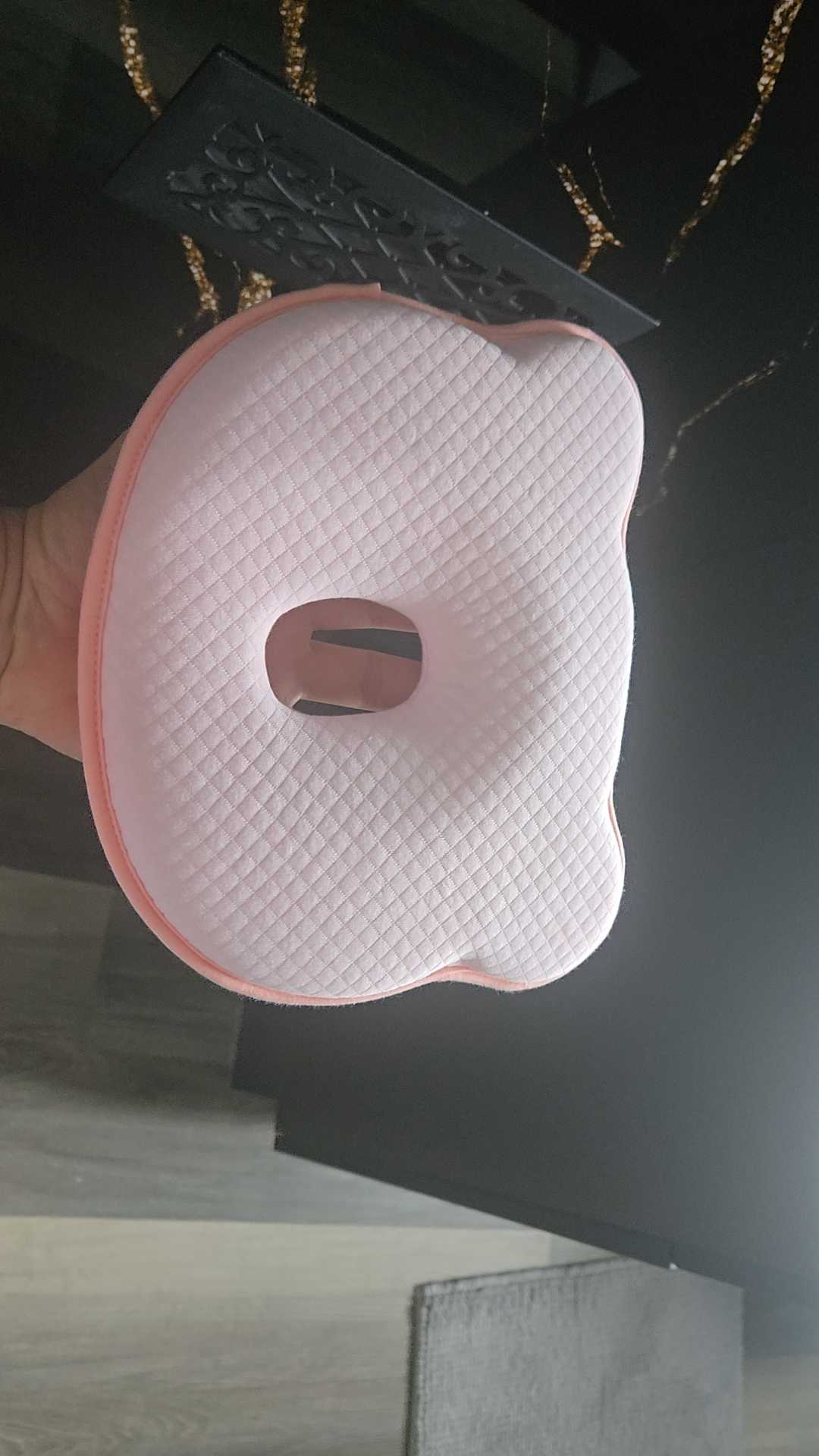 I bought this head shaping pillow for my newborn. The fabric is gentle on baby's skin and it doesn't make him sweat while sleeping. The ergonomic design holds his head well. Really a good purchase!